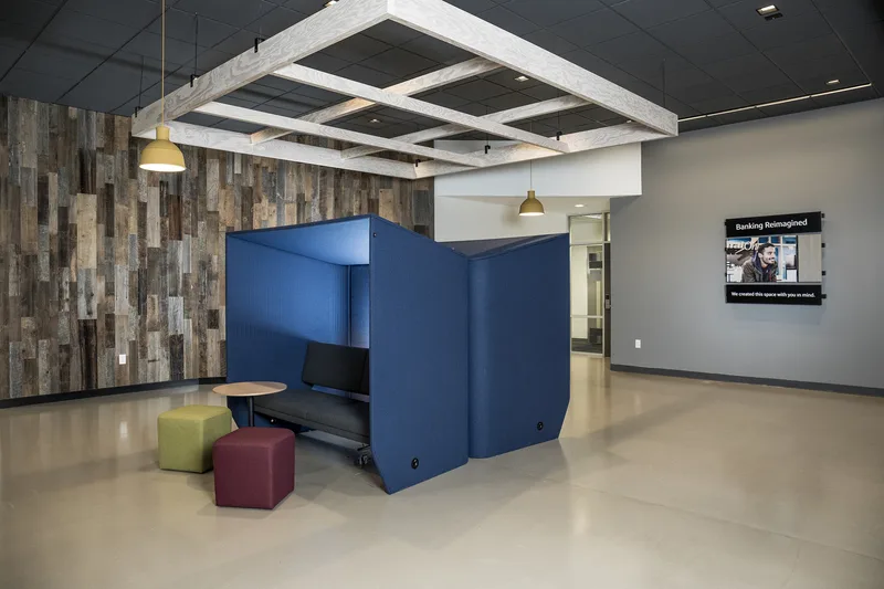 Capital One Bank interior blue privacy booth reclaimed wood accent wall