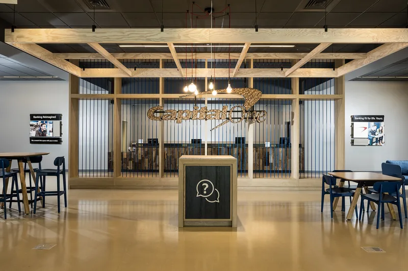 Capital One branded interior environmental portrait setting with wood beam ceiling