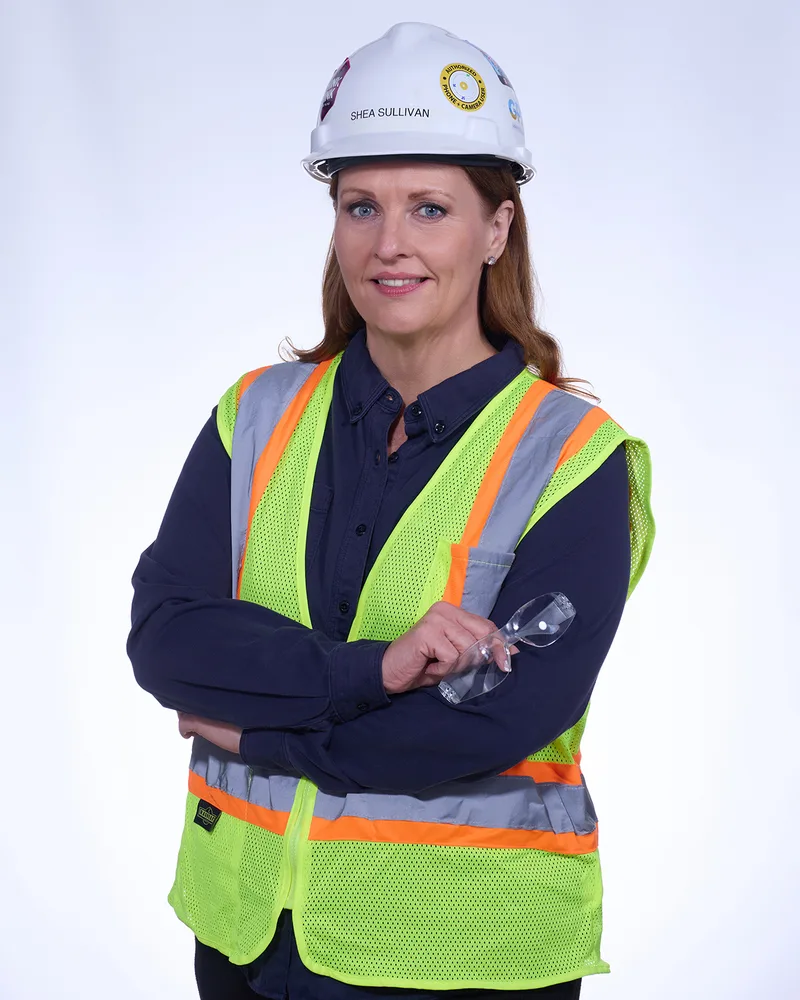 Executive headshot session with hard hat and safety vest