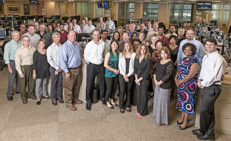 Chevron PSAT large corporate group portrait diverse professionals business attire open office