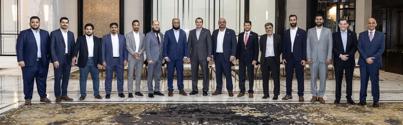 WORLEY SASRES event formal executive group portrait marble lobby interior