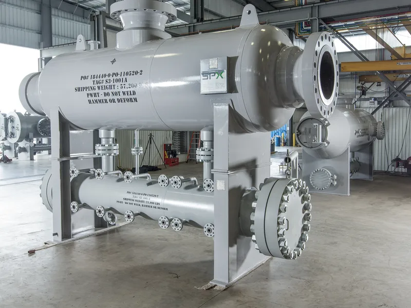 Pressure vessel SPX gray painted steel shell-and-tube unit with flanged nozzles