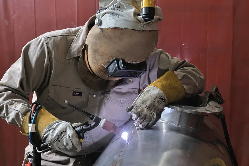 TIG welding stainless steel pressure vessel with Tillman gloves and LAPCO gear